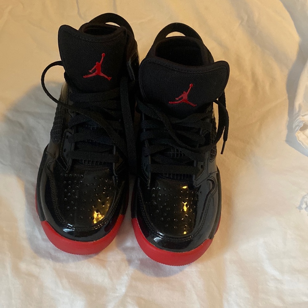 Red and black Air Jordan boys size 4.5 sneakers